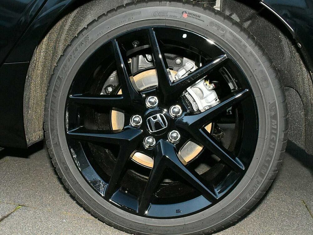 Honda Civic e: HEV Sport. .. Sport