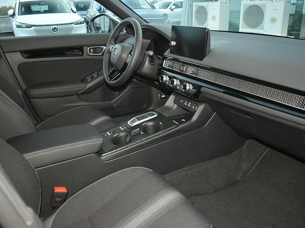 Honda Civic e: HEV Sport. .. Sport