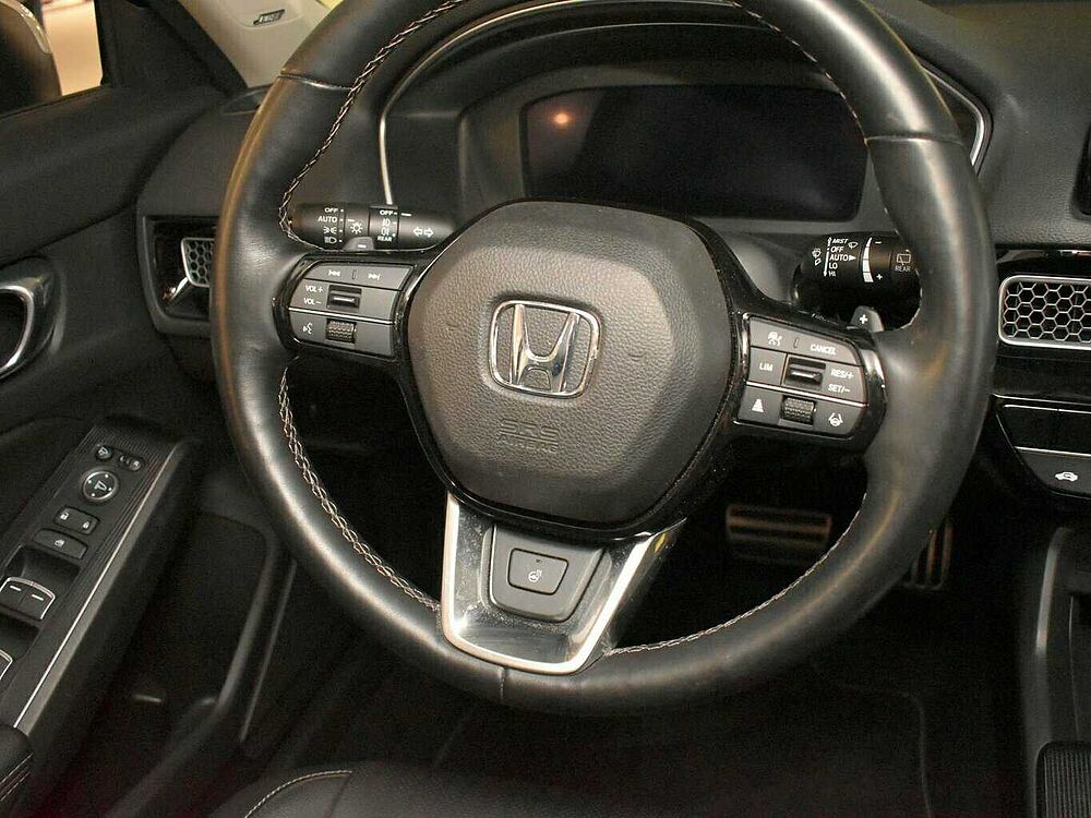 Honda Civic e: HEV Advance. .. Advance