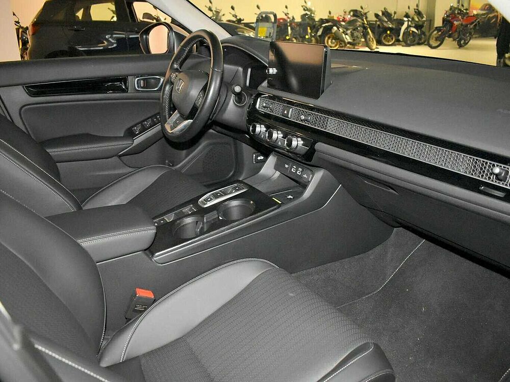 Honda Civic e: HEV Advance. .. Advance