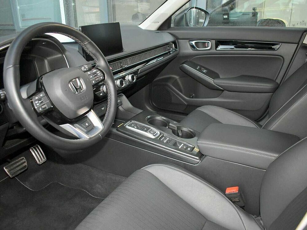 Honda Civic e: HEV Advance. .. Advance