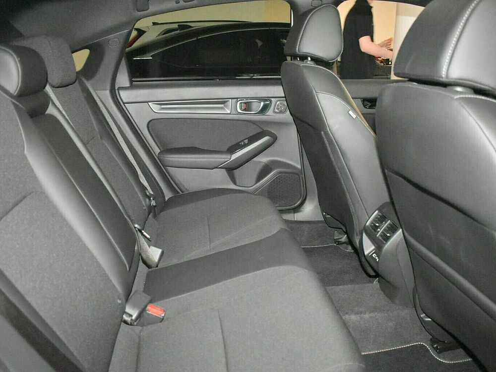 Honda Civic e: HEV Sport. .. Sport