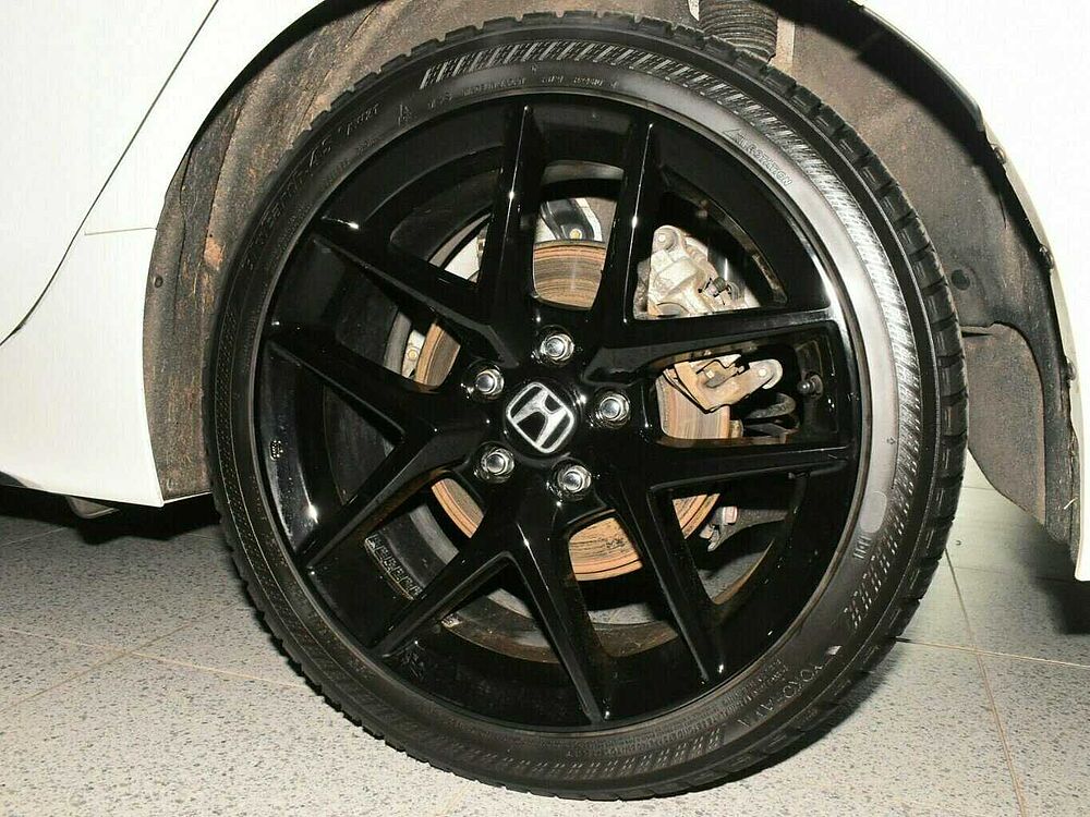 Honda Civic e: HEV Sport. .. Sport