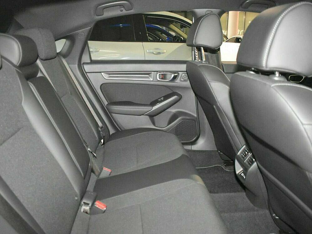 Honda Civic e: HEV Sport. .. Sport