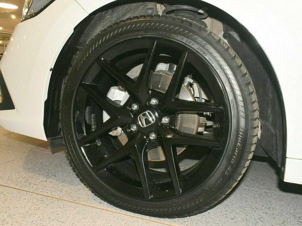 Honda Civic e: HEV Sport. .. Sport
