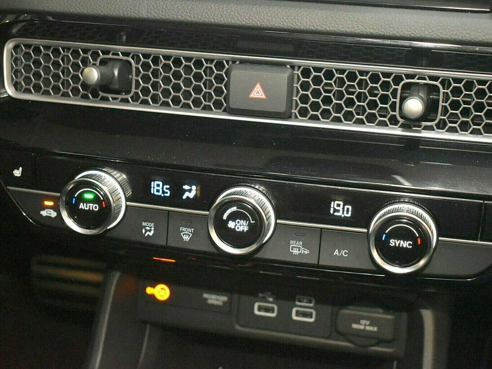 Honda Civic e: HEV Sport. .. Sport