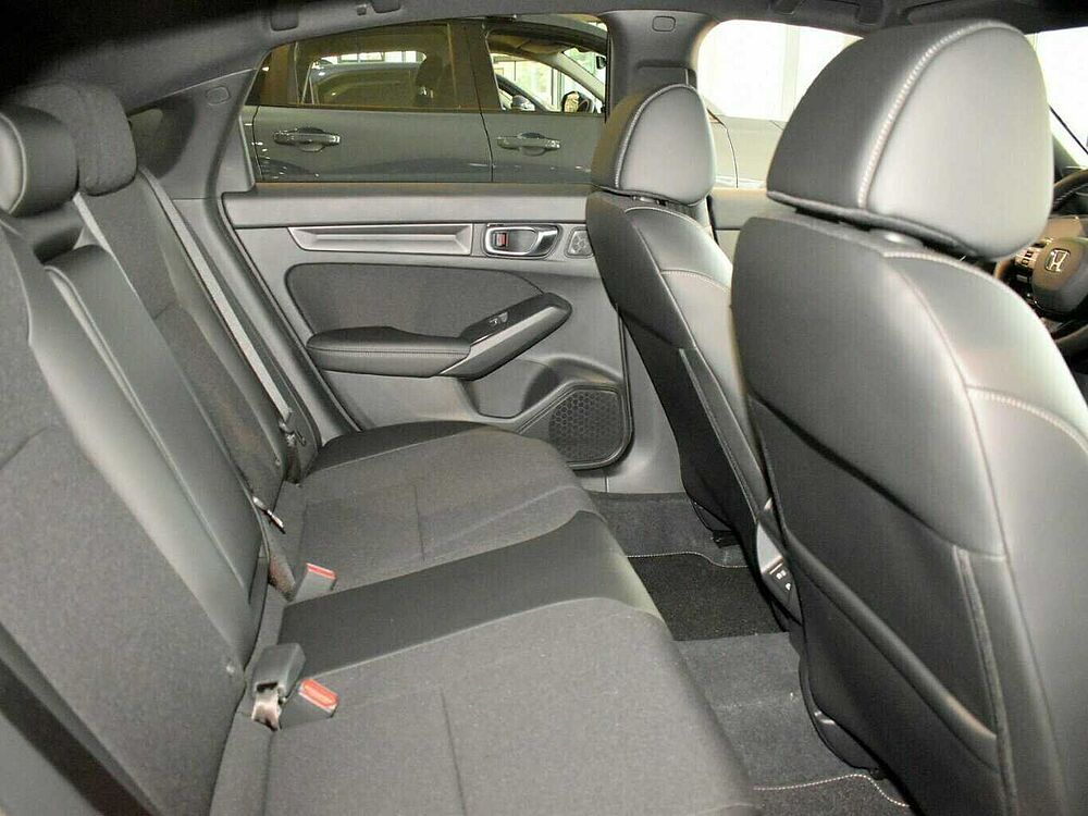 Honda Civic e: HEV Sport. .. Sport