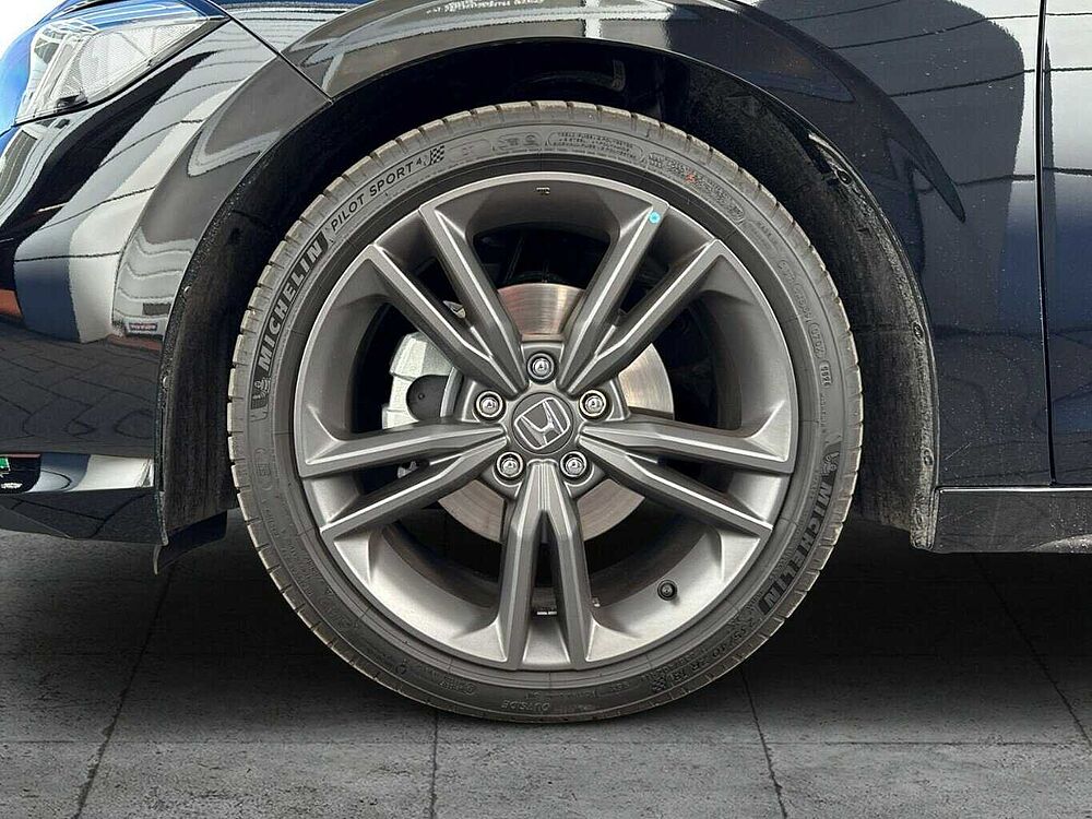 Honda Civic e: HEV Sport. .. Sport