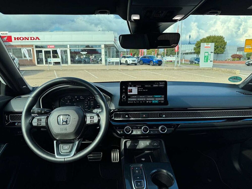Honda Civic e: HEV Advance Black-Emblem Einstiegsbel.