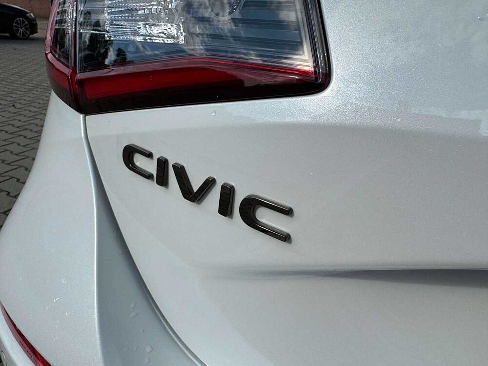 Honda Civic e: HEV Advance Black-Emblem Einstiegsbel.