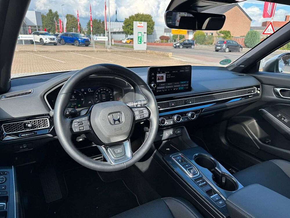 Honda Civic e: HEV Advance Black-Emblem Einstiegsbel.